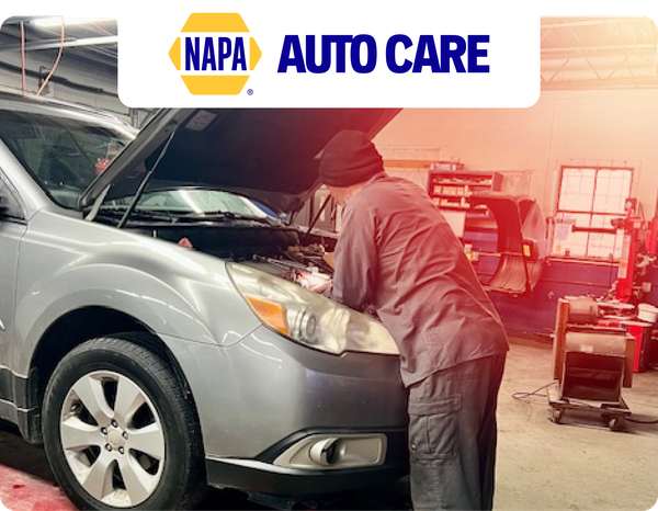 Napa auto care mechanic working on car | KC Auto Solutions