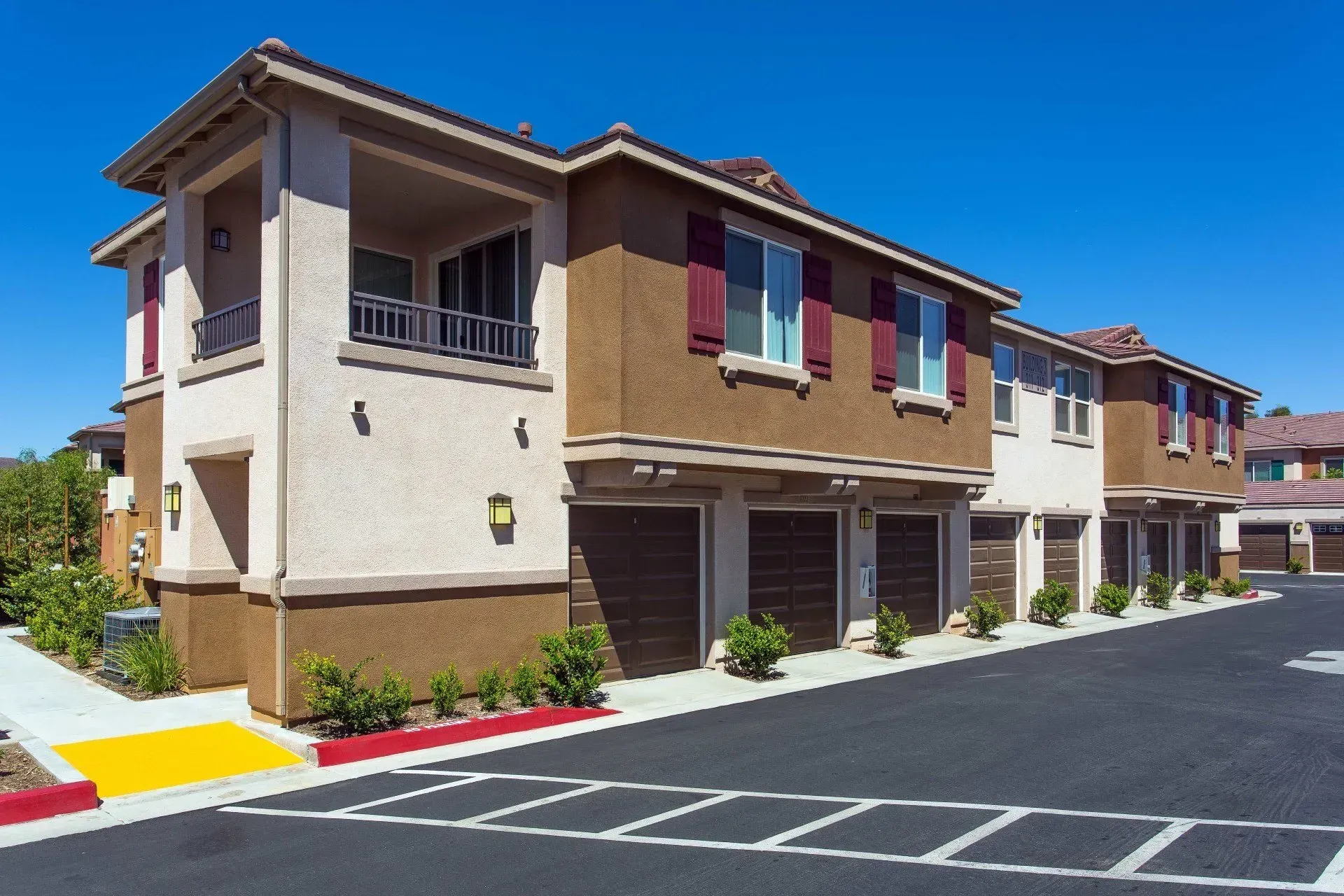 photo showing the community with garages on the first floor