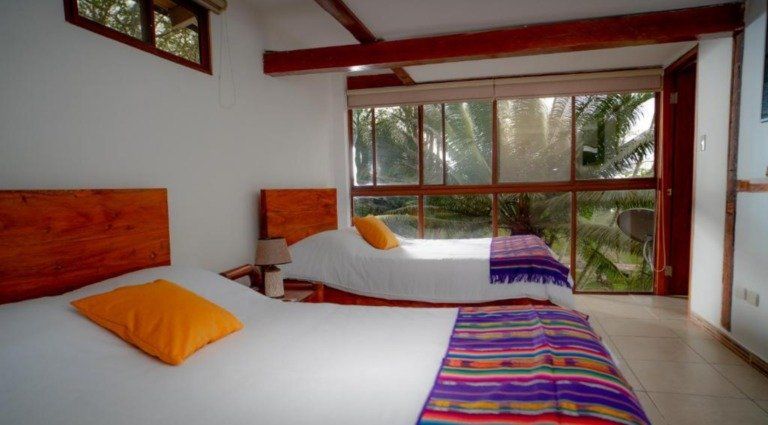 elegant room overlooking the ocean and gardens with a cozy feel
