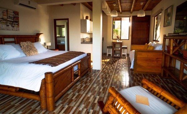 elegant room overlooking the ocean with a luxury feel. Suite with balcony