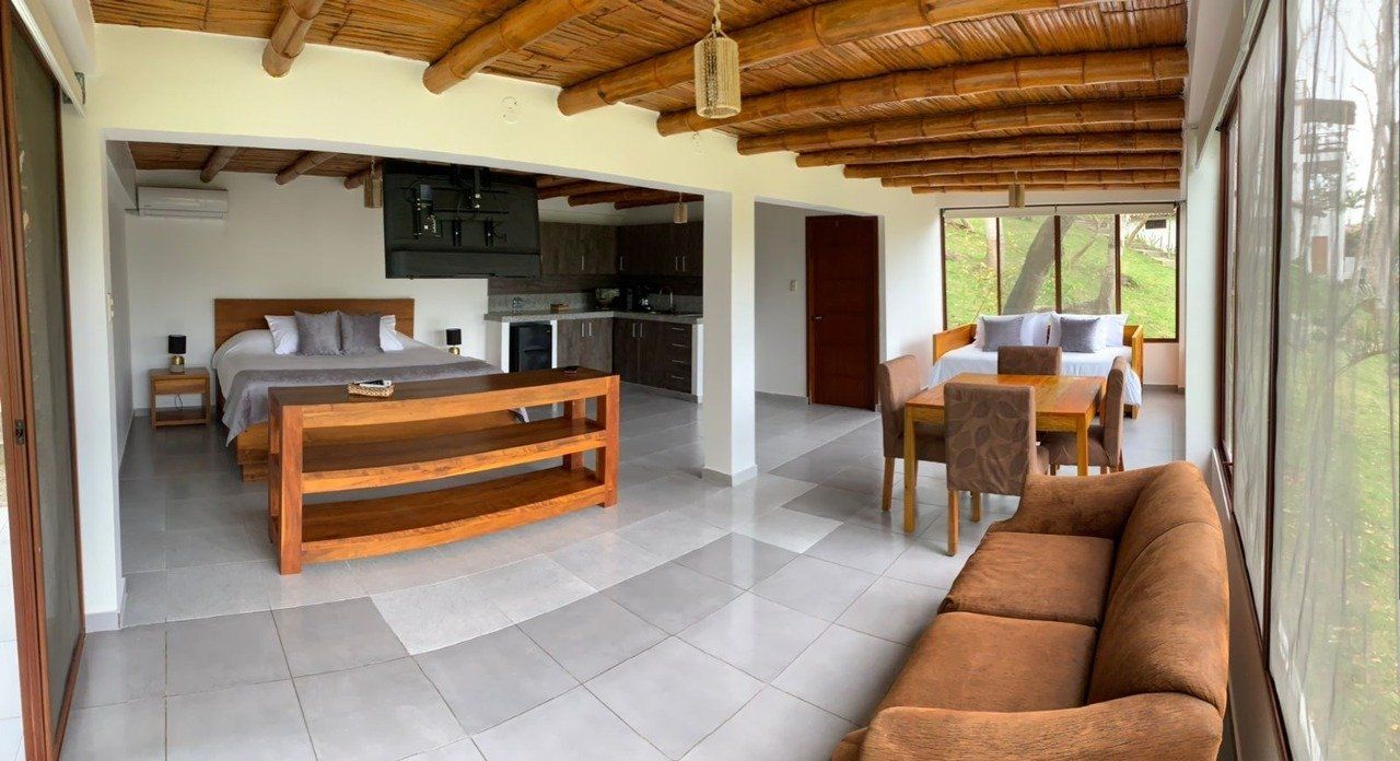 elegant room overlooking the ocean with a luxury feel. Suite with balcony
