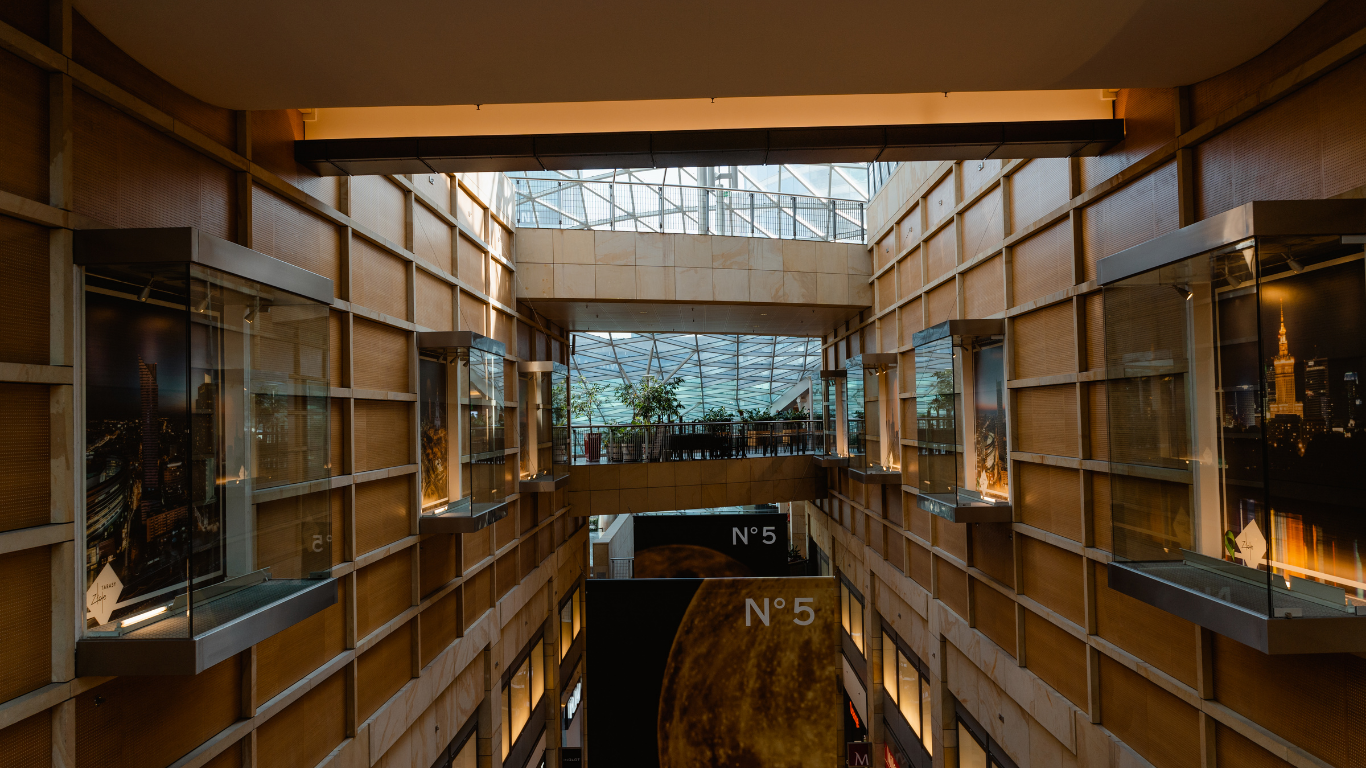 A large building with a lot of windows and a ceiling.