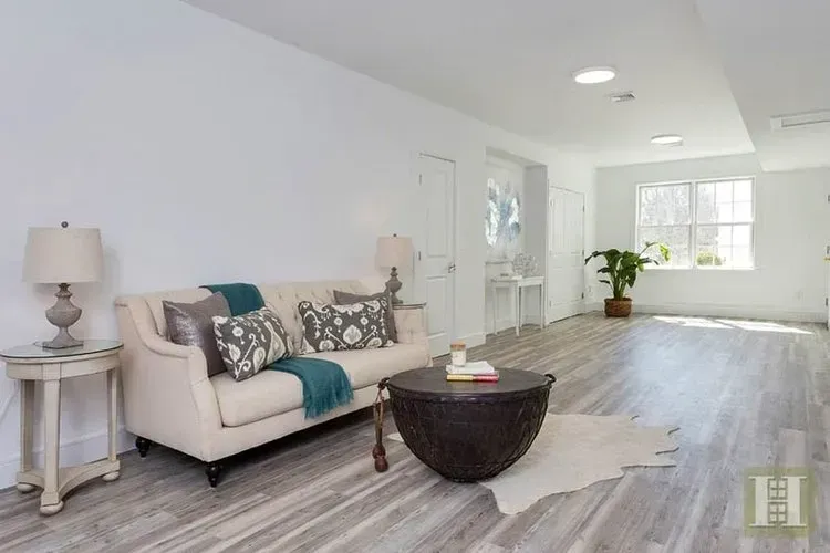 There is a couch and a coffee table in the living room.