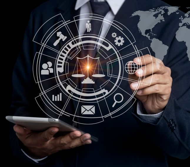 Businessman holding a tablet with futuristic digital interface and globe graphics against a dark background