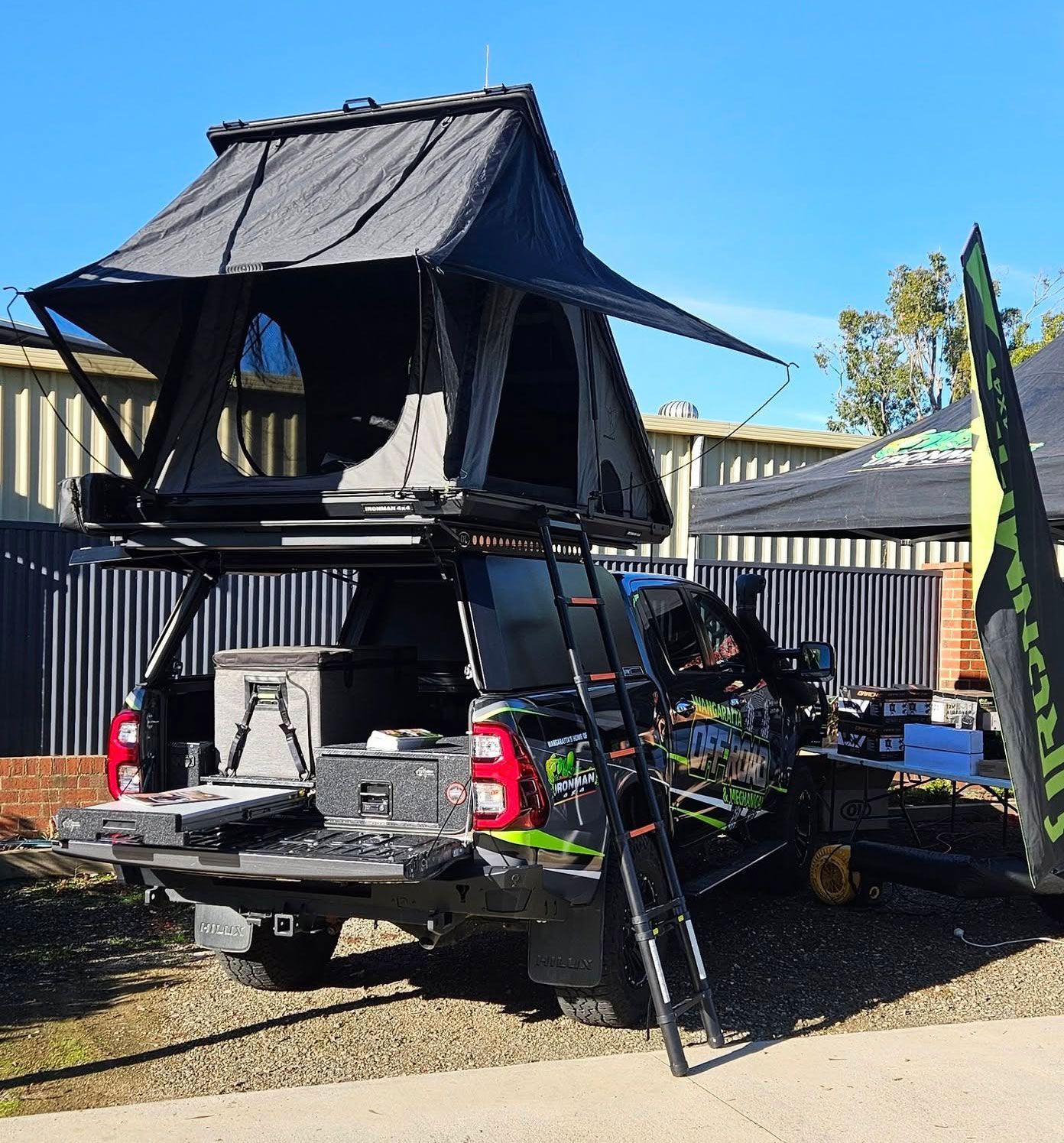 Rooftop Tent And A Ladder On A Vehicle