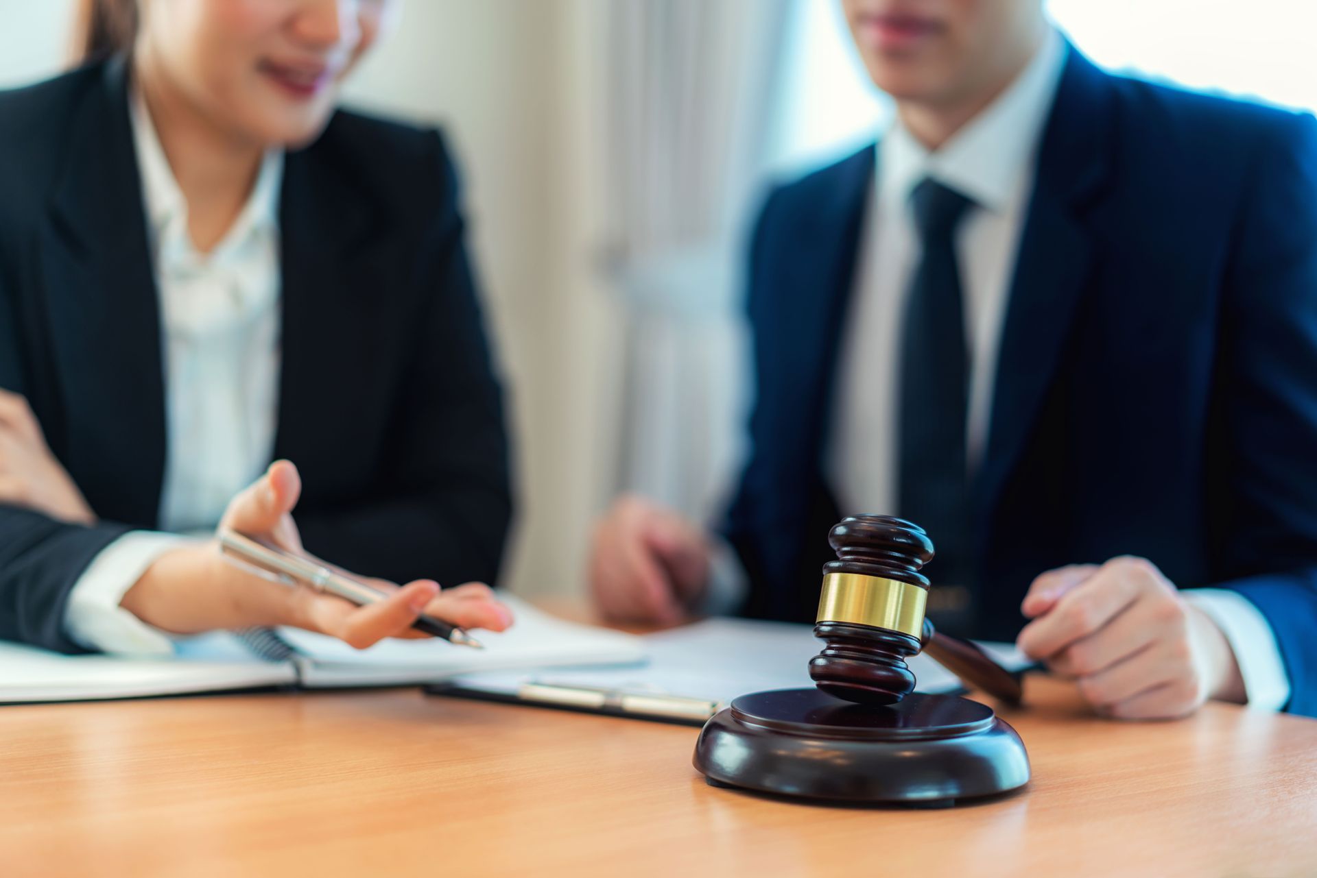 Two Lawyer In Front Of A Gavel — The Law Offices Of Cardaro & Peek, LLC