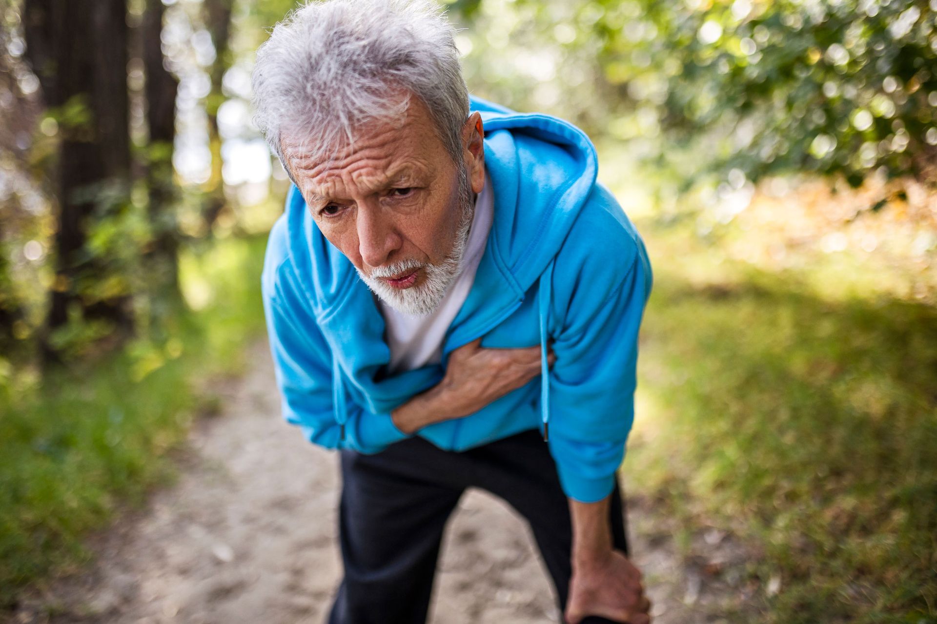 Old Man Holding Chest — Baltimore & Washington DC — The Law Offices Of Cardaro & Peek, LLC