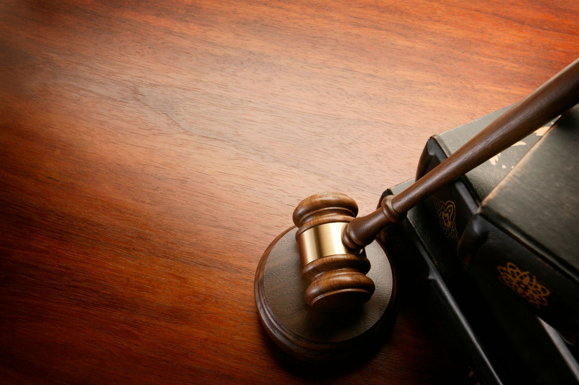 A Gavel With Dim Light Background — The Law Offices Of Cardaro & Peek, LLC A Gavel With Dim Light Background — The Law Offices Of Cardaro & Peek, LLC