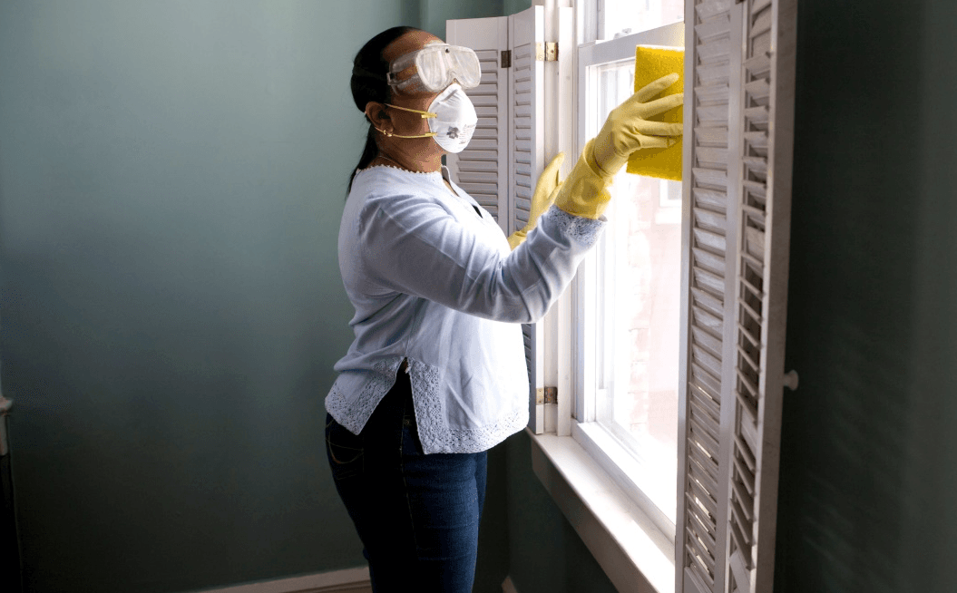 A person with OCD cleaning obsessively