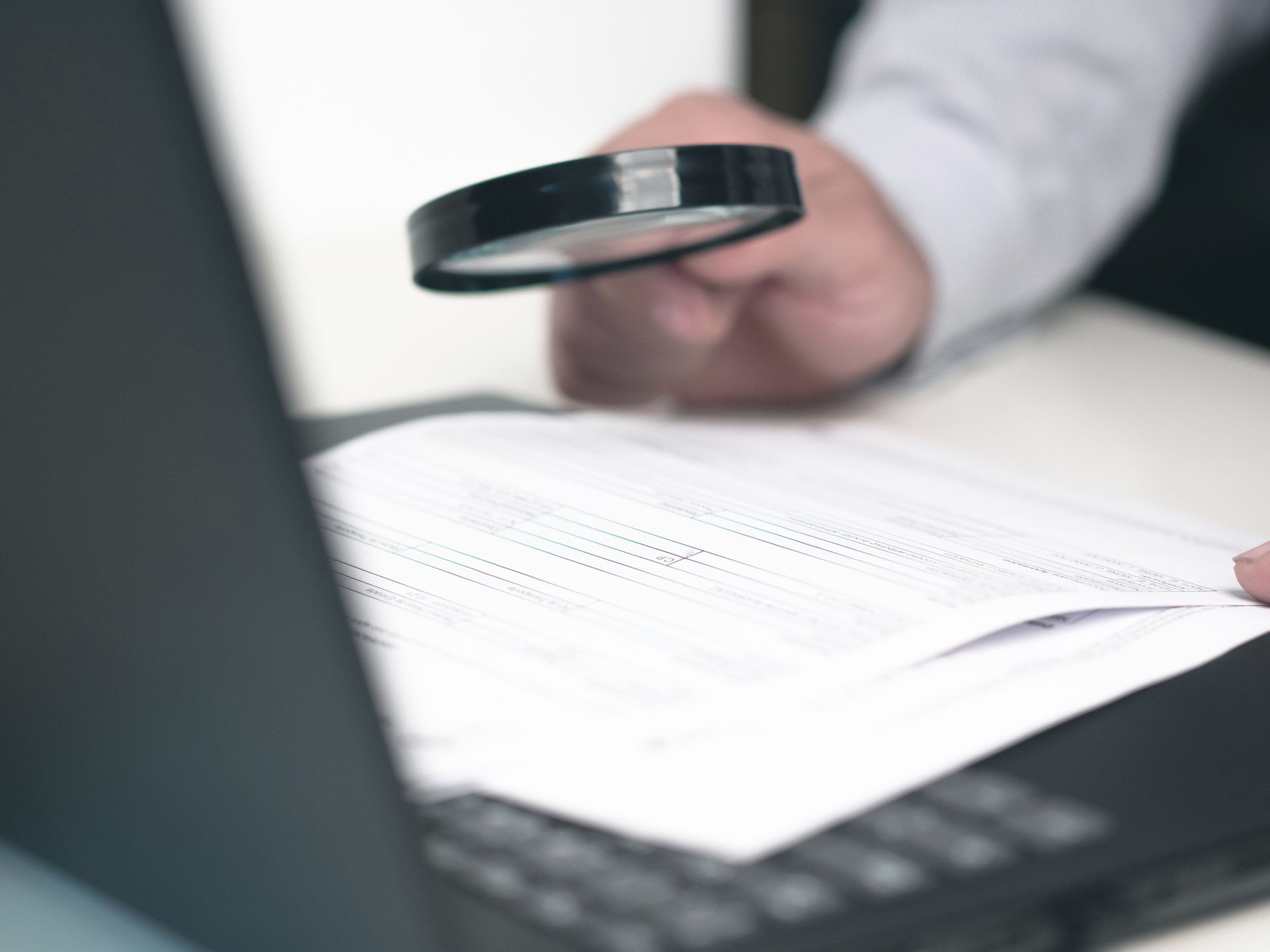 Using magnifying glass— Examination of Legal Document Services In Roseville, CA