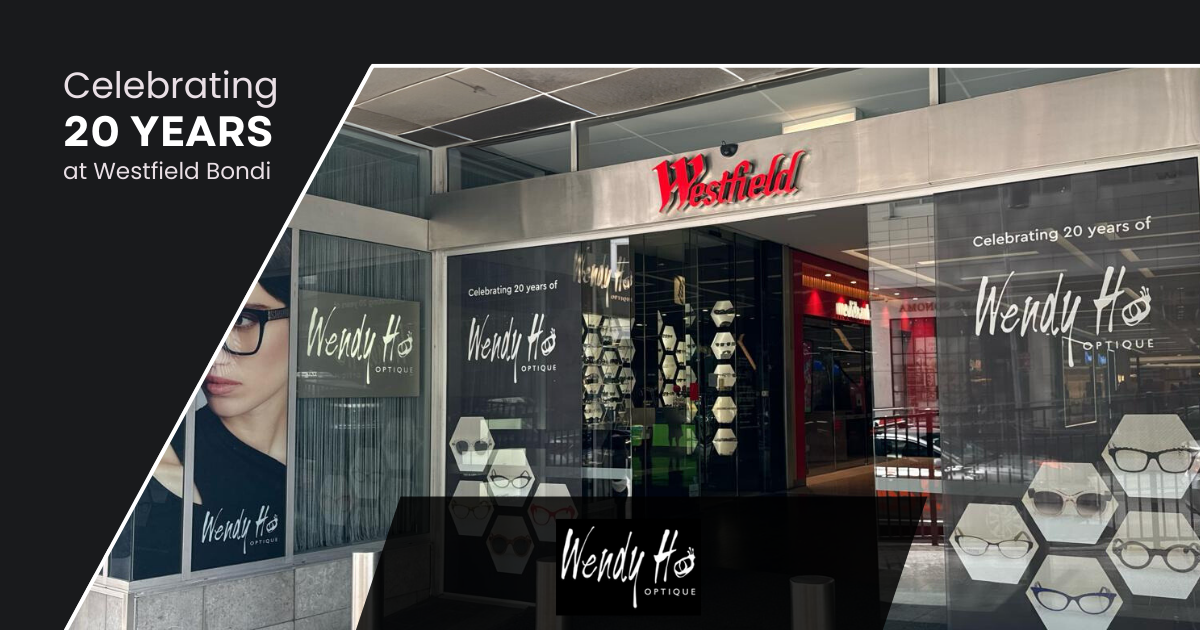 Westfield store celebrating 20 years with a store front; a person with glasses and sunglasses displayed on the right.
