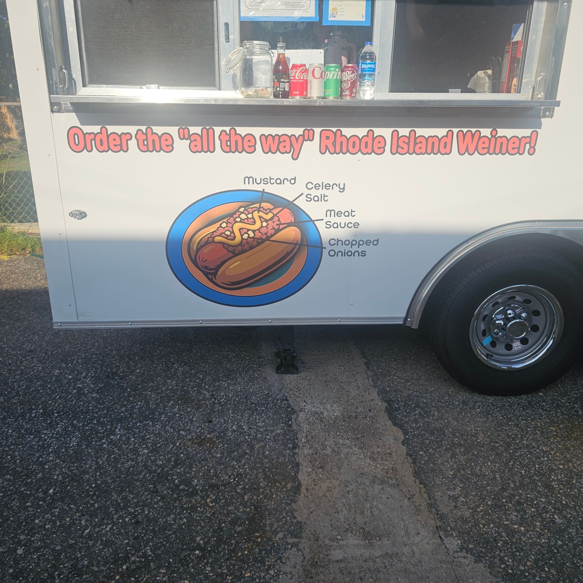 A food truck with an image of an all the way wiener.
