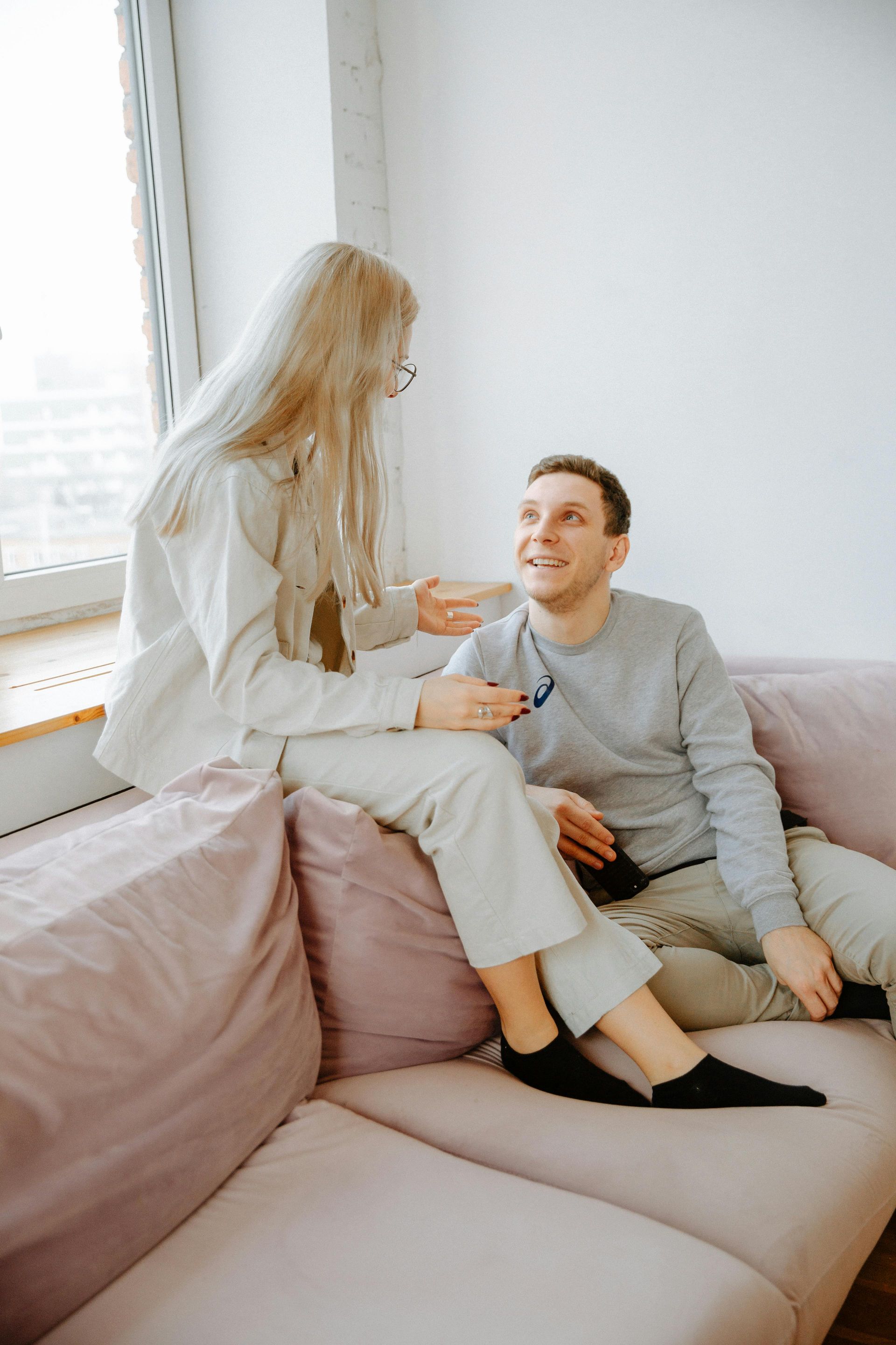A man and woman talking