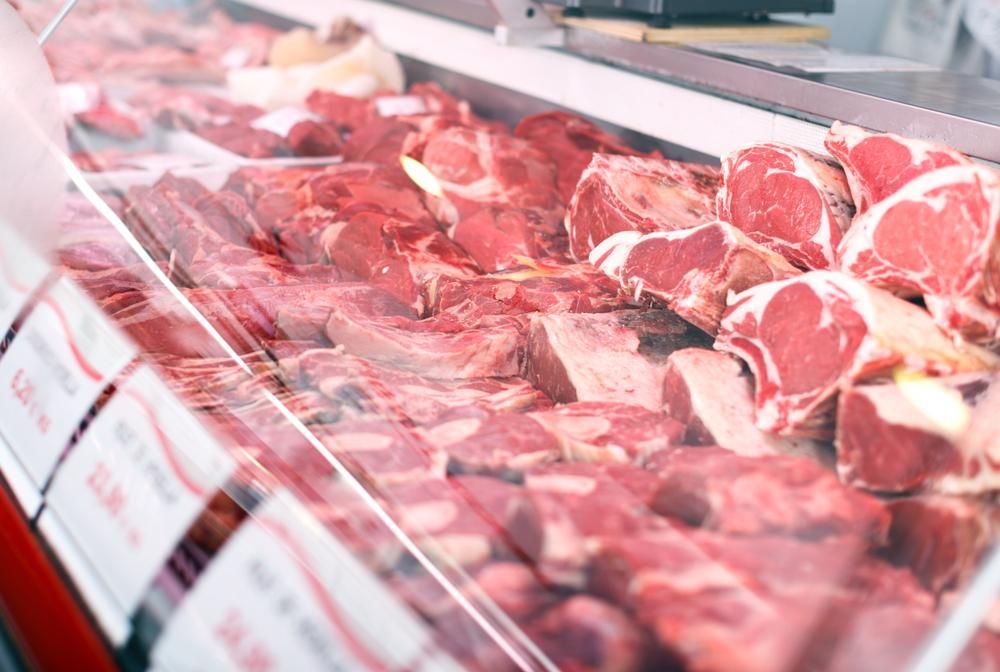 A Display Case Filled with Lots of Raw Meat in A Butcher Shop — Holiday Coast Meat & Smallgoods in Coffs Harbour, NSW