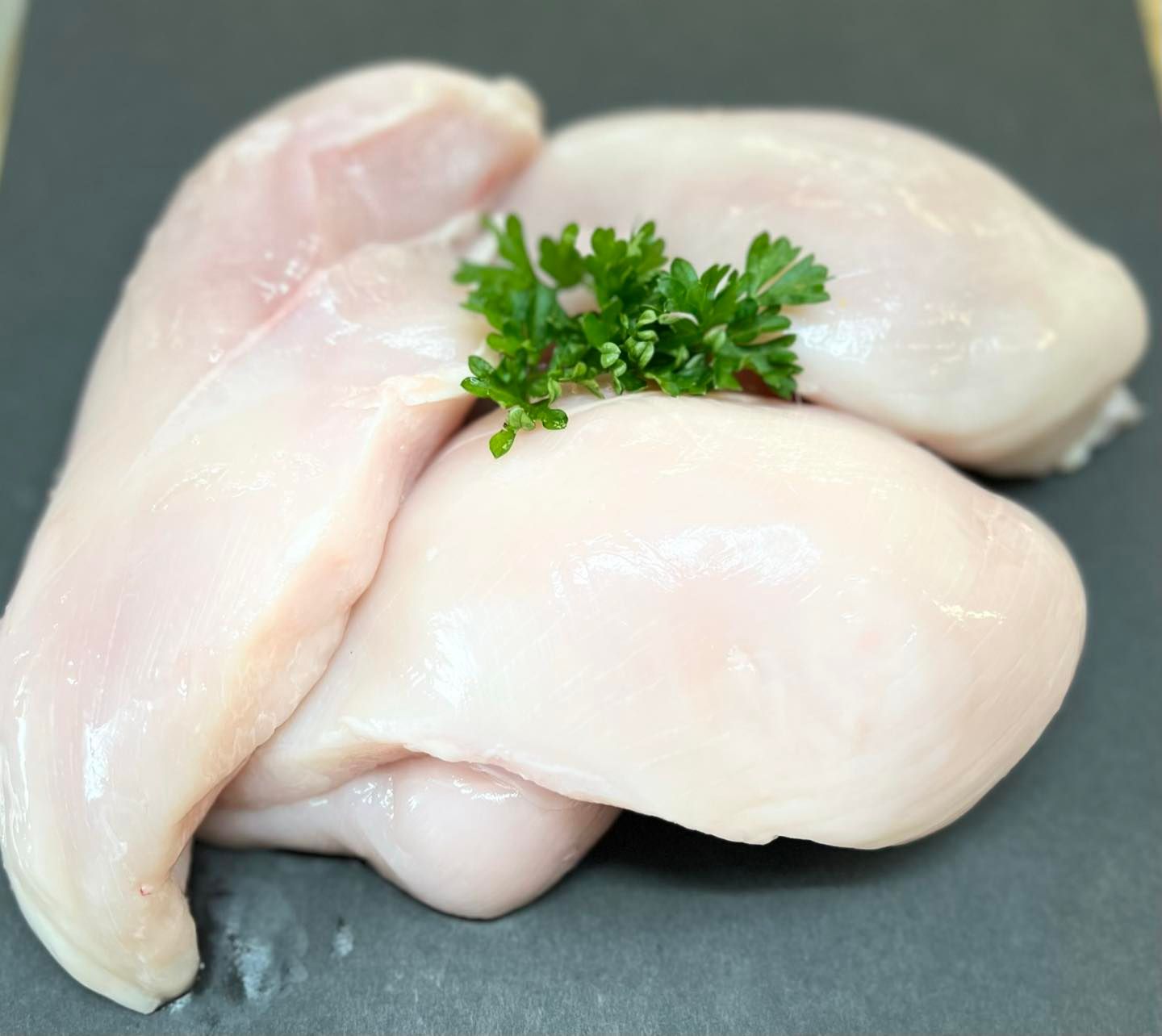 Chicken Fillets on chopping board — Holiday Coast Meat & Smallgoods in South Grafton, NSW
