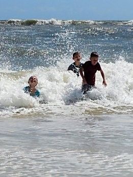 Kids Swimming at the Beach