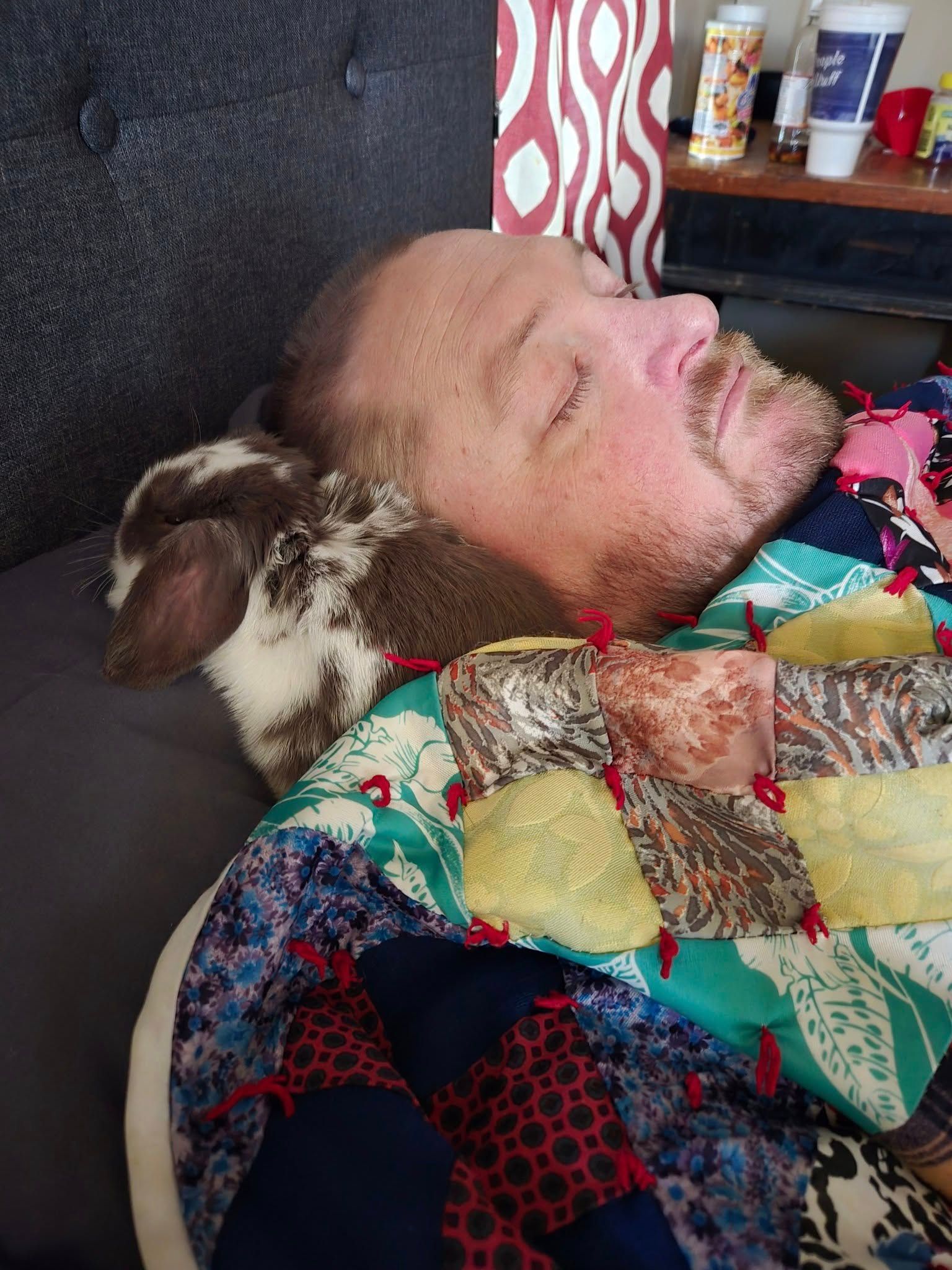 Man Sleeping with Broken Chocolate Bunny next to his head