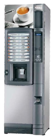 un distributore automatico di caffè con sopra una tazza di caffè.