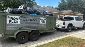 IronFlex junk removal truck and trailer serving Hillsborough and Polk County