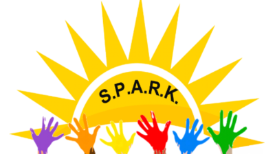 S.P.A.R.K. logo with a yellow sunburst above colorful raised hands