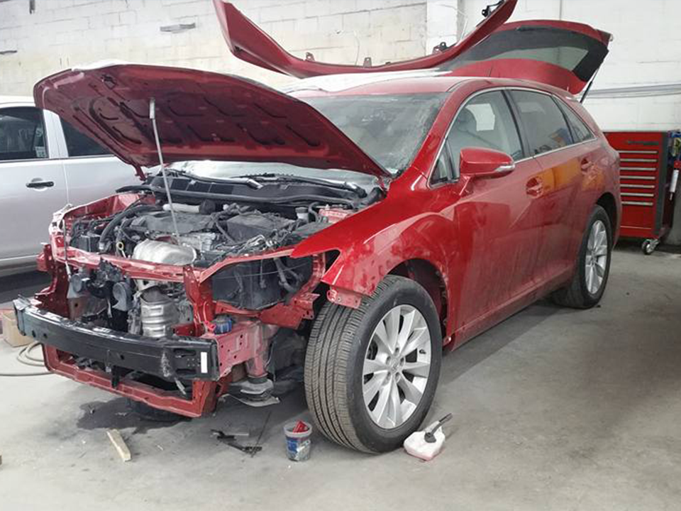 Collision & Paint Services Deluxe Paint & Body Works