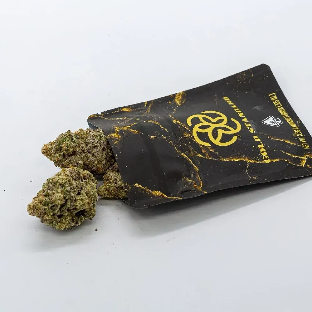 Gold Standard cannabis flower 3.5g buds and black packaging