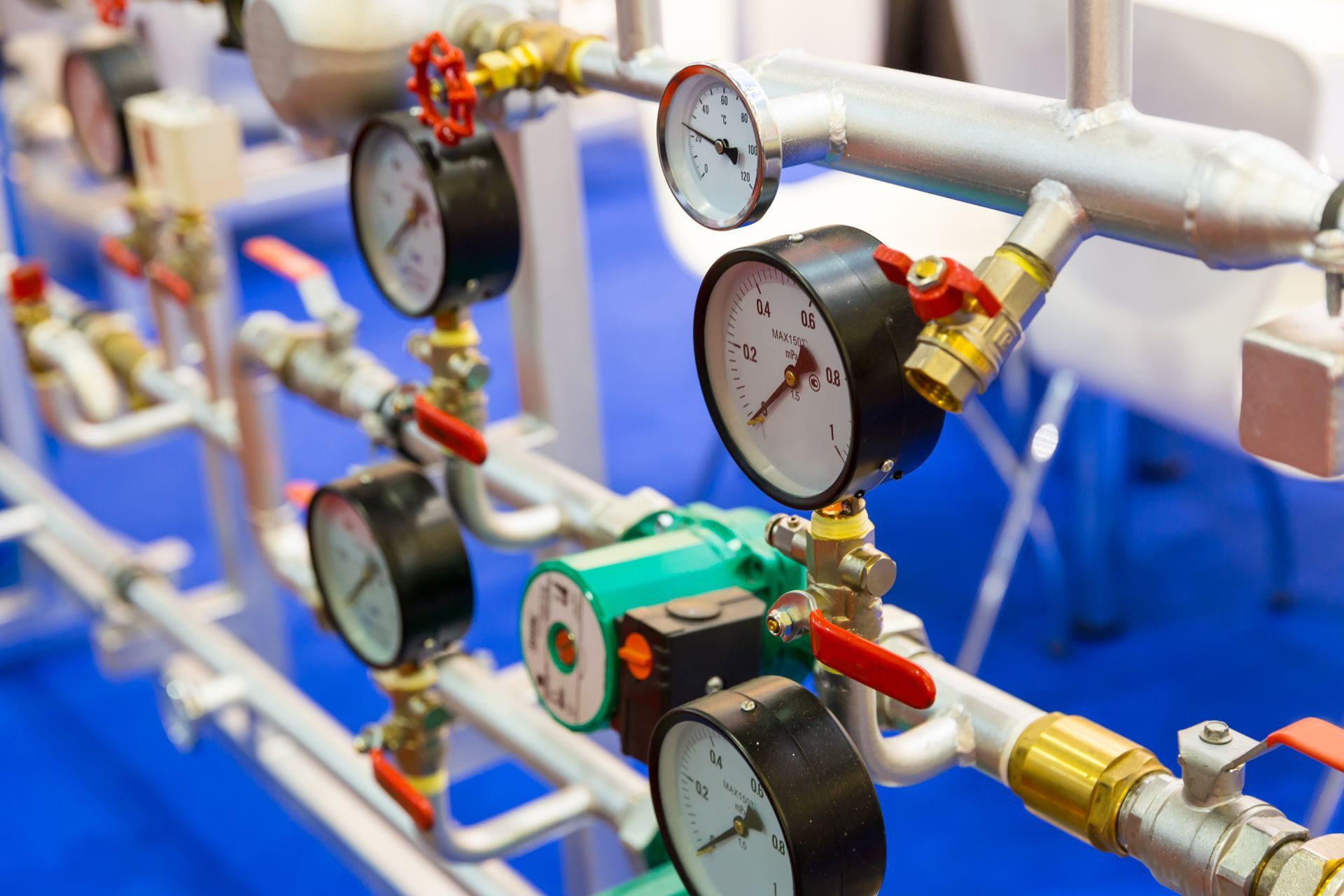 Industrial pipes with pressure gauges and valves in a mechanical system
