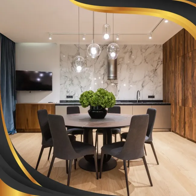 A dining room with a round table and chairs