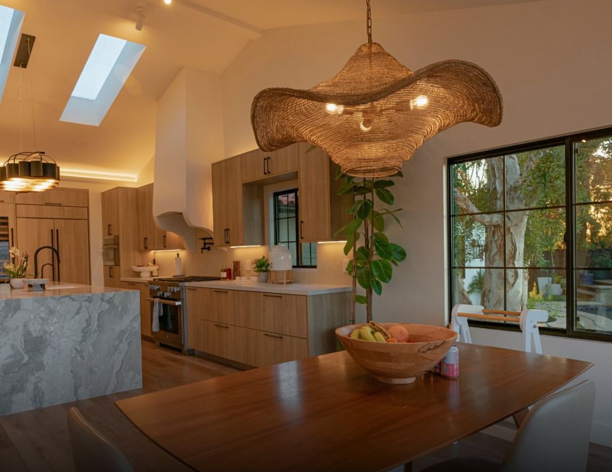 The Dinner Table & Lighting From a Mid-Missouri Home Renovated By Big Tree Construction.