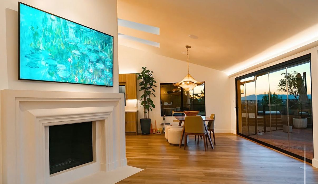 TV & Fireplace, Leading to Patio From Mid-Missouri Builders at Big Tree Construction