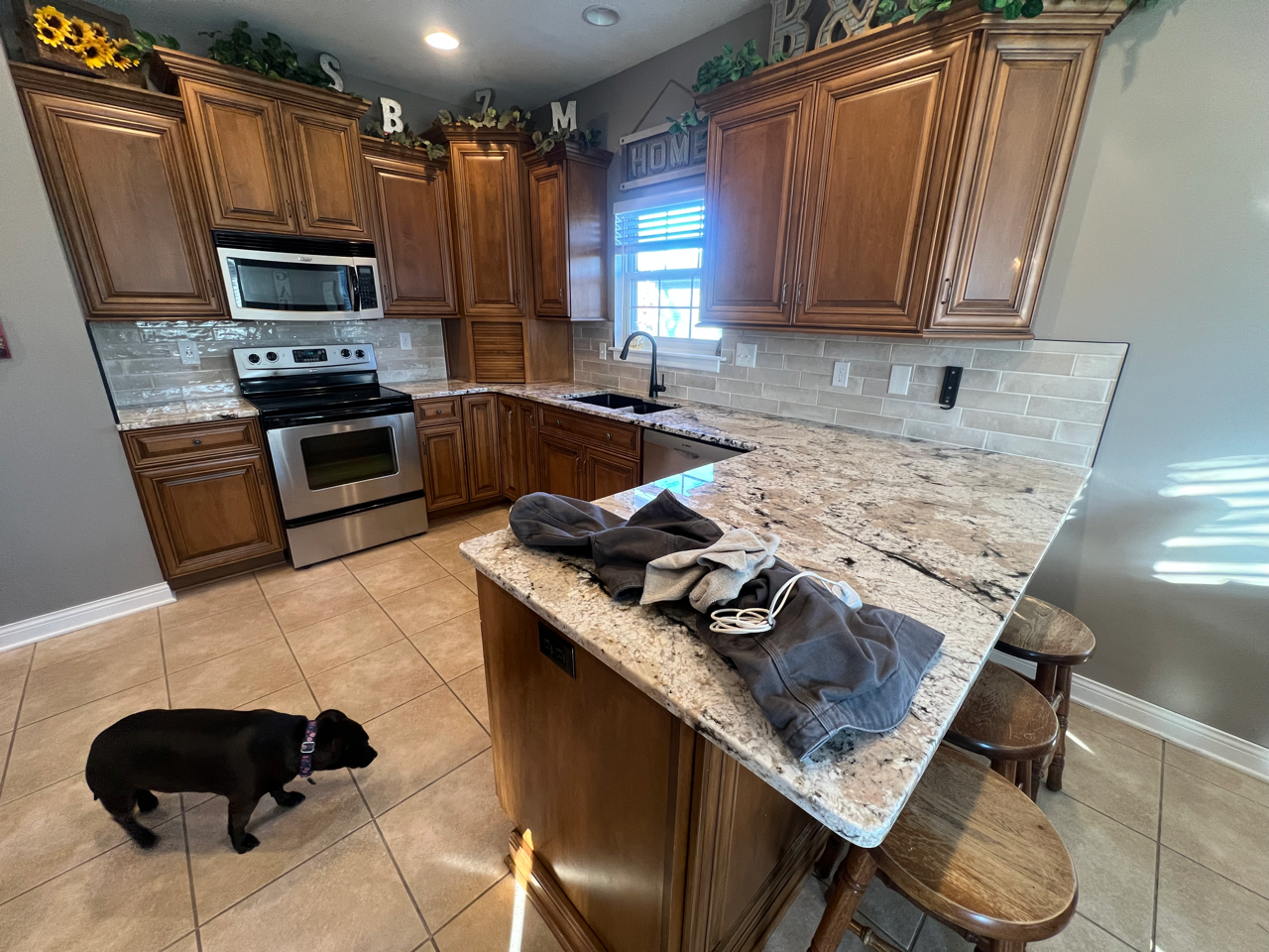 Wooden Cabinets & New Countertops in a Kitchen Remodel From Big Tree Construction in Mid-MO