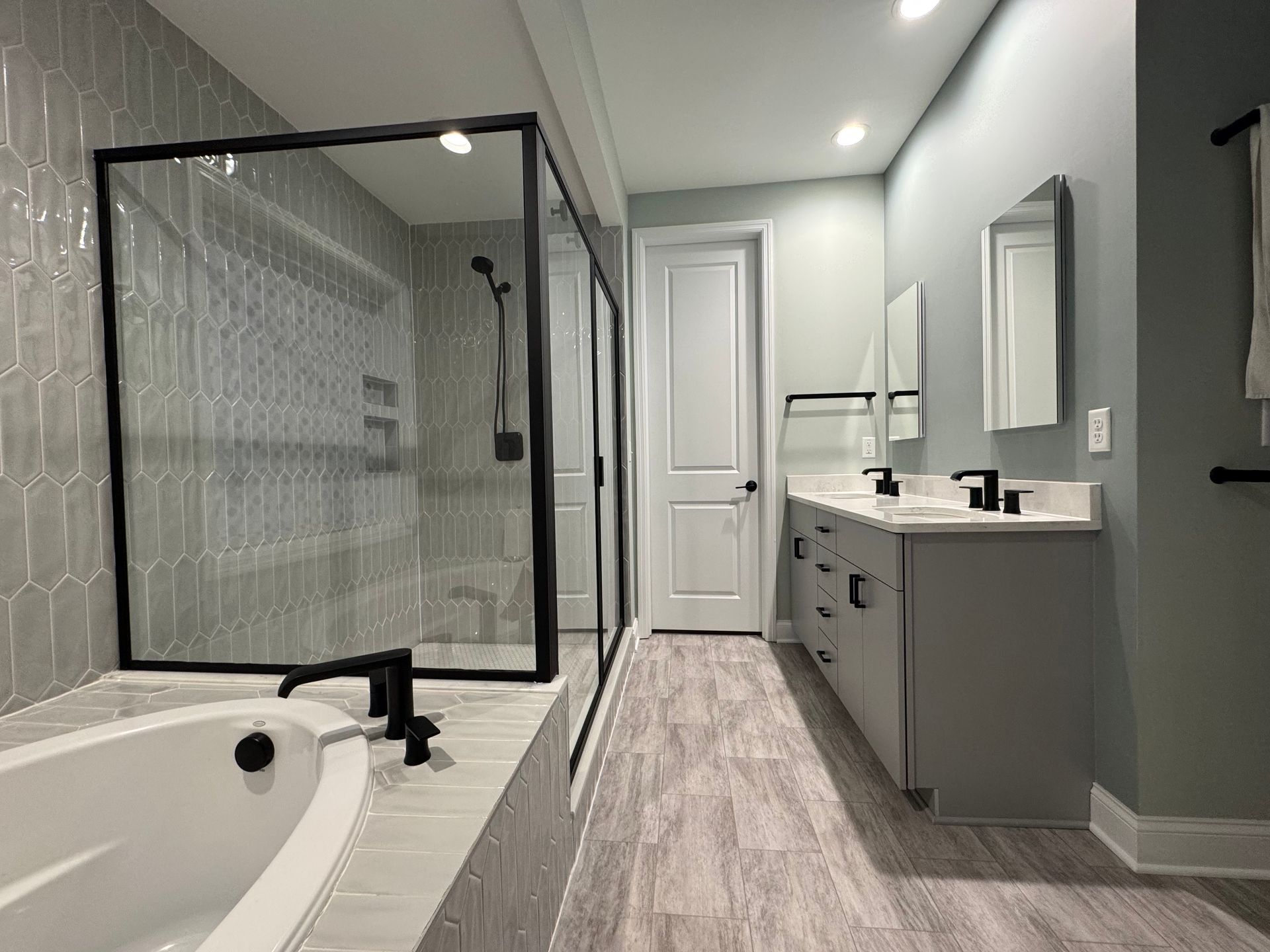 Clean Up in a Custom Bathroom Made By Big Tree Construction in Central Missouri.