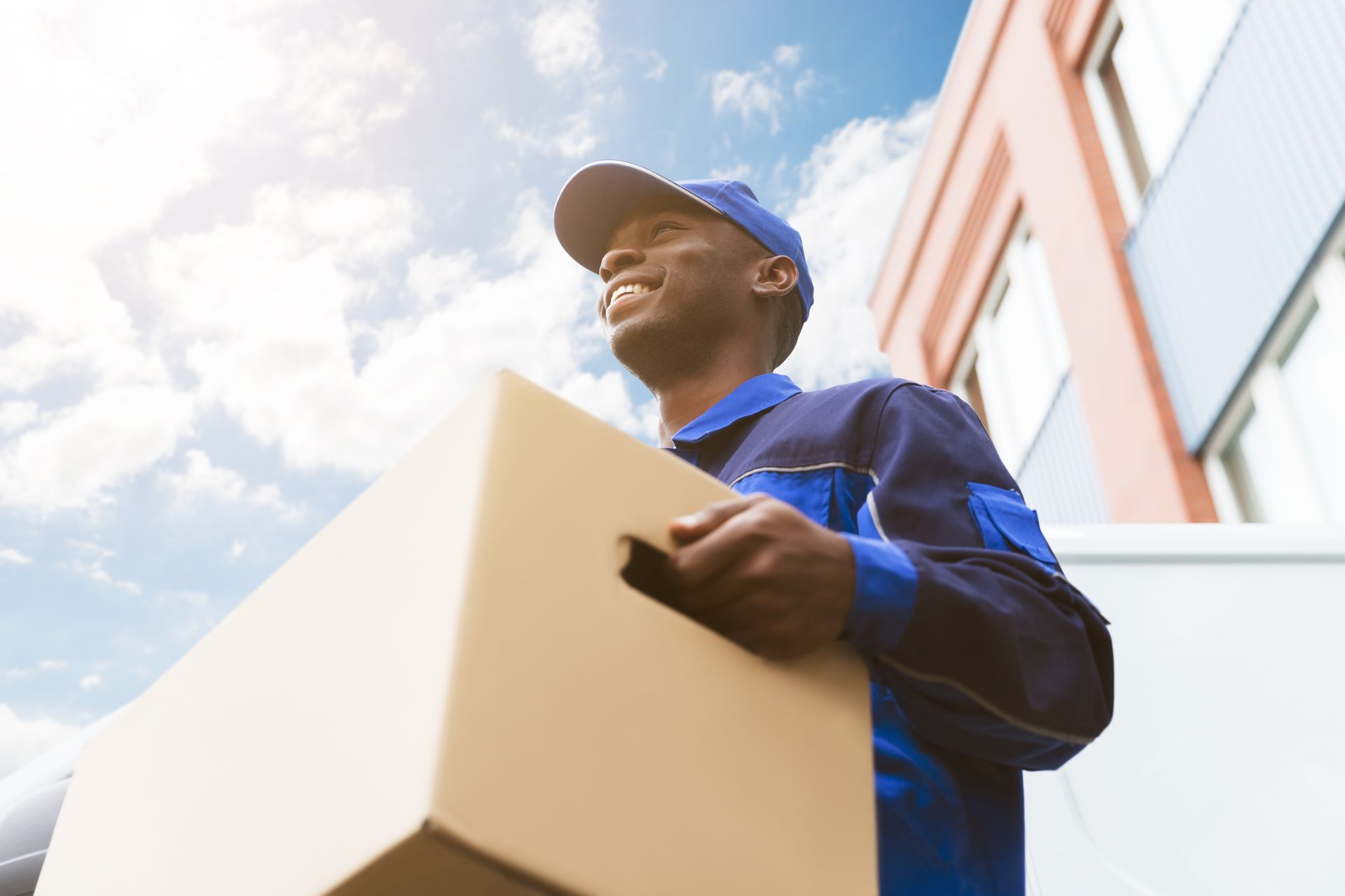 Man Holding Moving Boxes