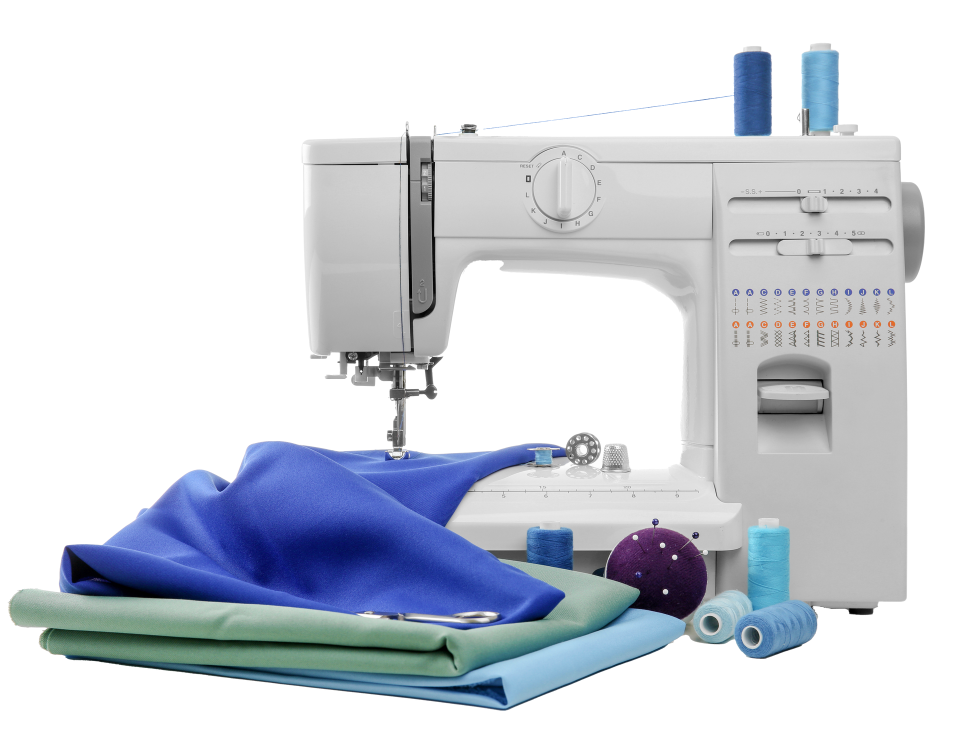 Sewing machine with folded fabric and thread spools on a white background
