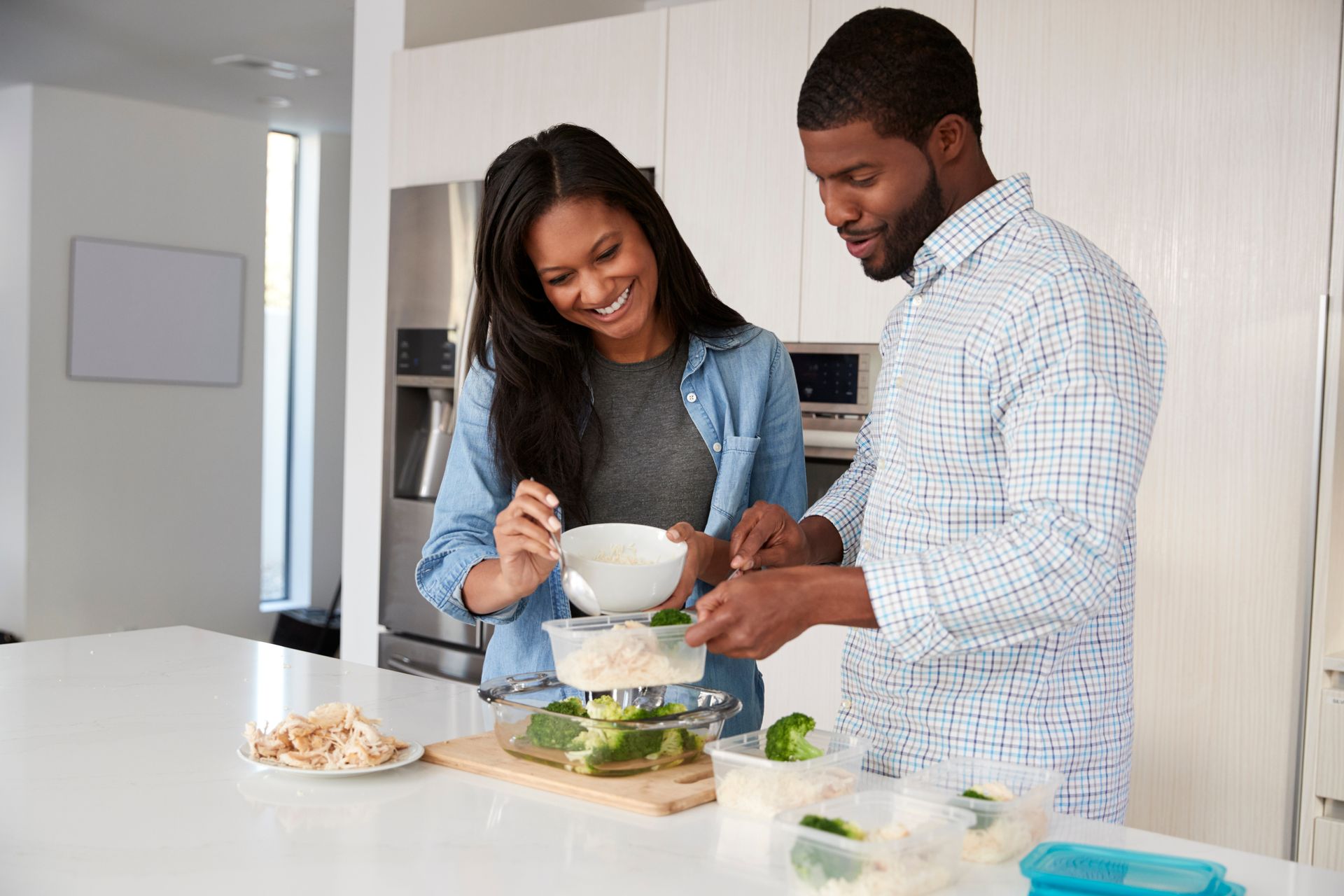 the man and his wife making food together for male fertility