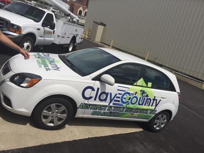 A white hatchback branded 