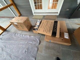 Movers carrying a couch