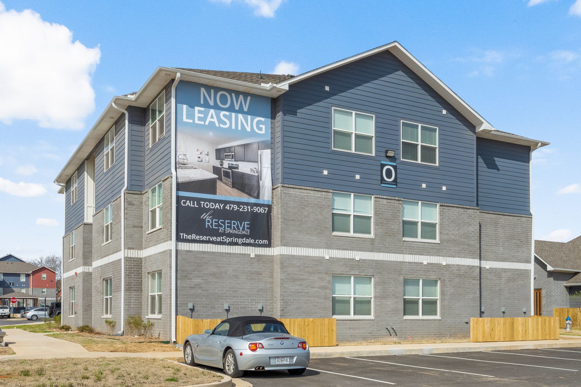 The Reserve at Springdale - Side building with leasing sign