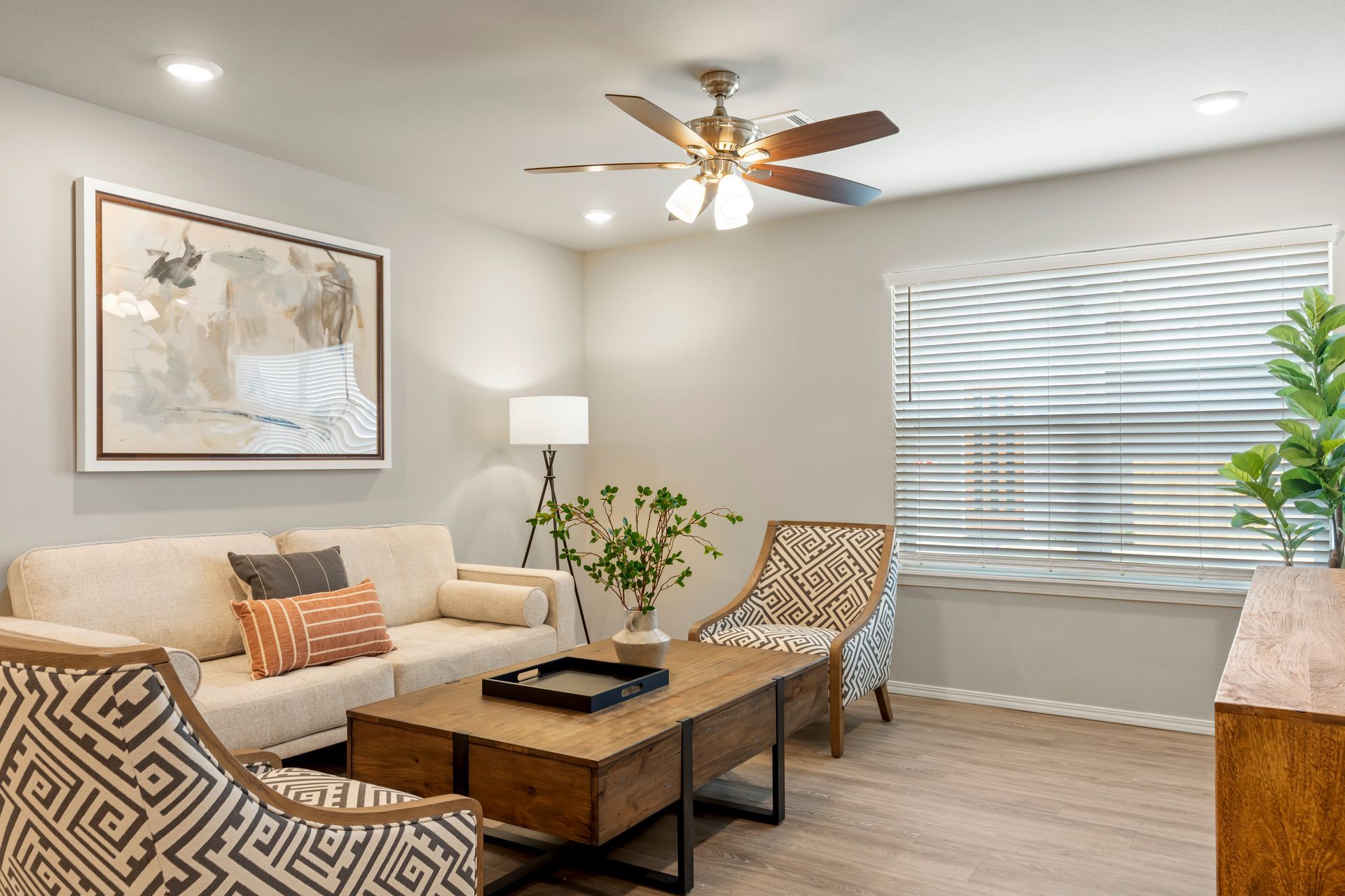 The Reserve at Springdale-furnished living room with celling fan and sofa 03