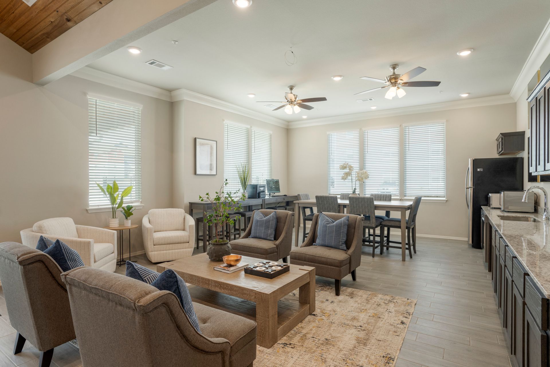 The Reserve at Springdale- Furnished Living room with sofa, coffee table and dining table