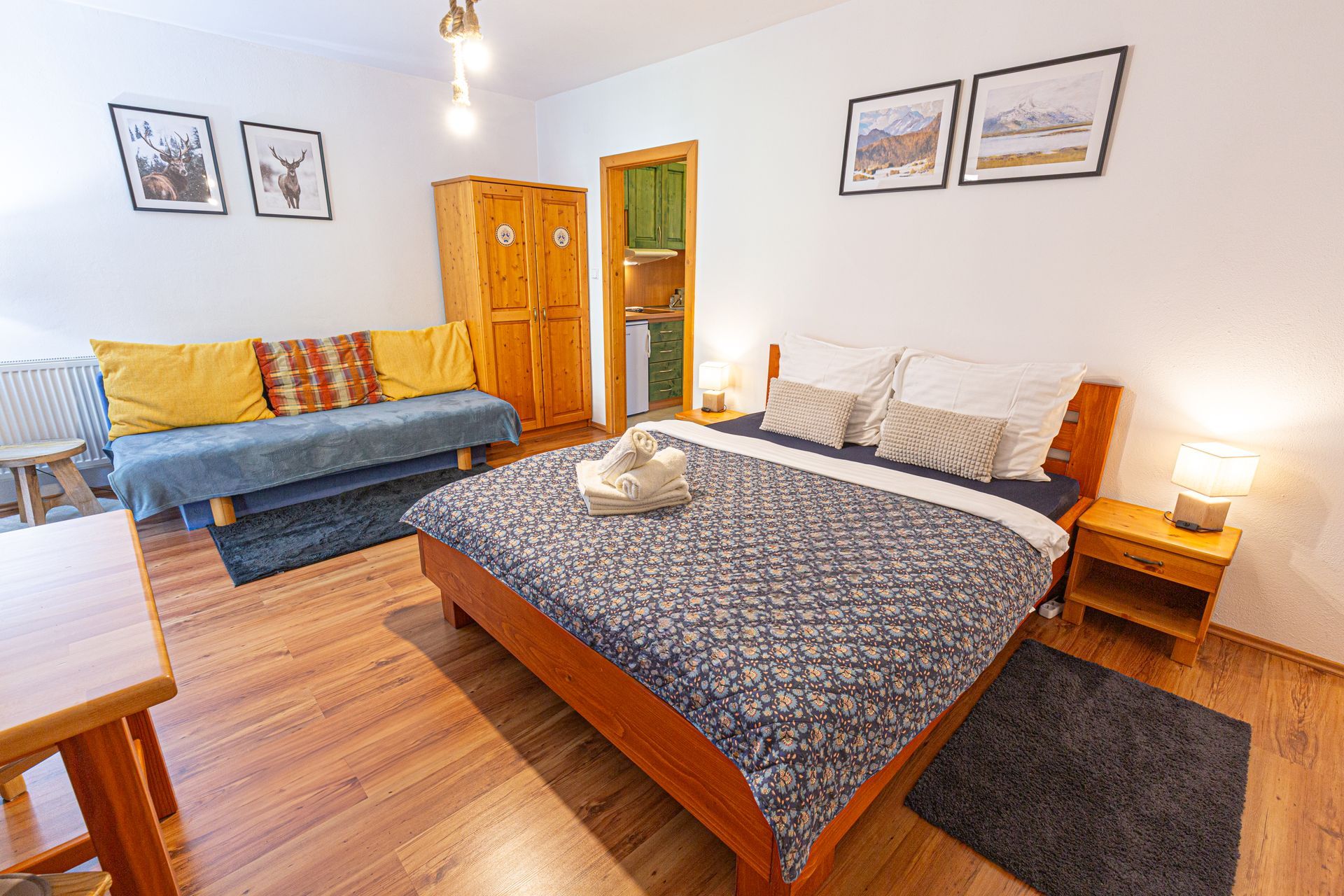room with extra bed on the couch