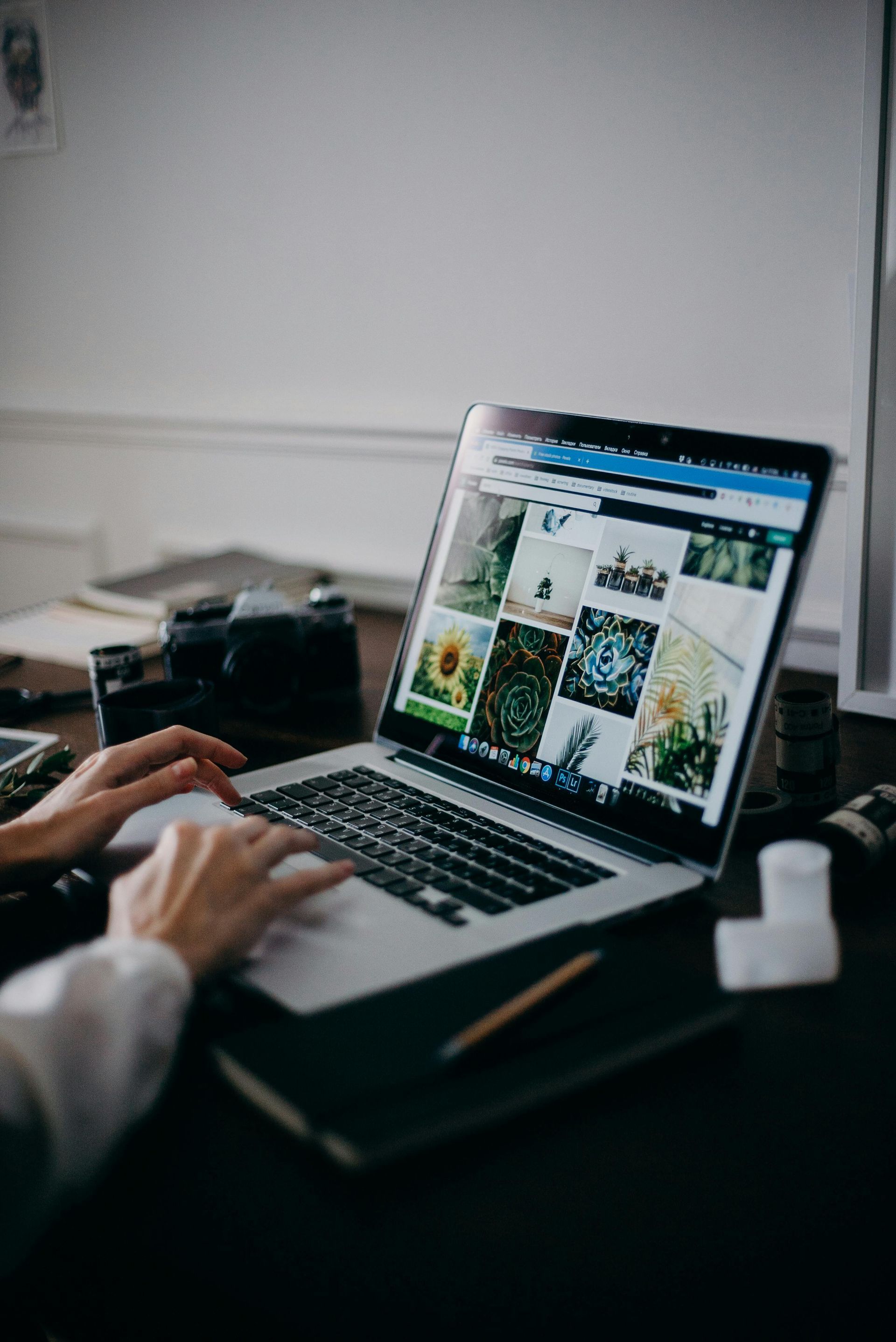 Person viewing a website on their laptop.