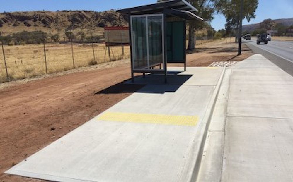 Top view of A Bus Stop With a Yellow Stripe on the Sidewalk — Diggamen Civil Contracting in Tivendale, NT