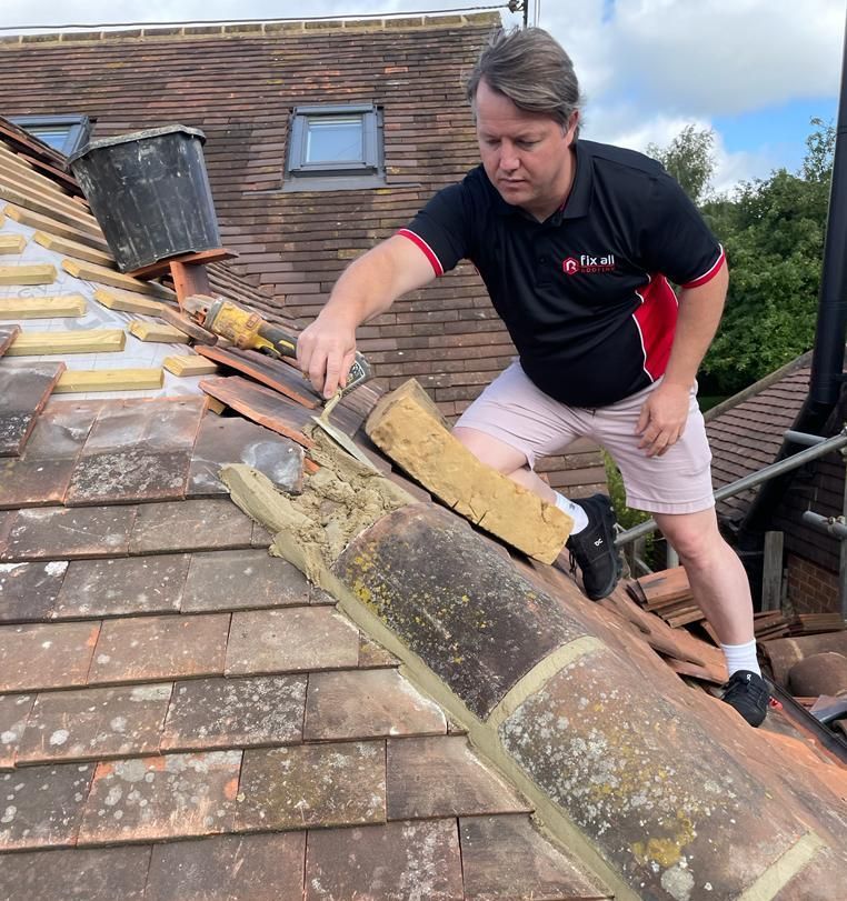 Roofer in High Wycombe repairing a roof