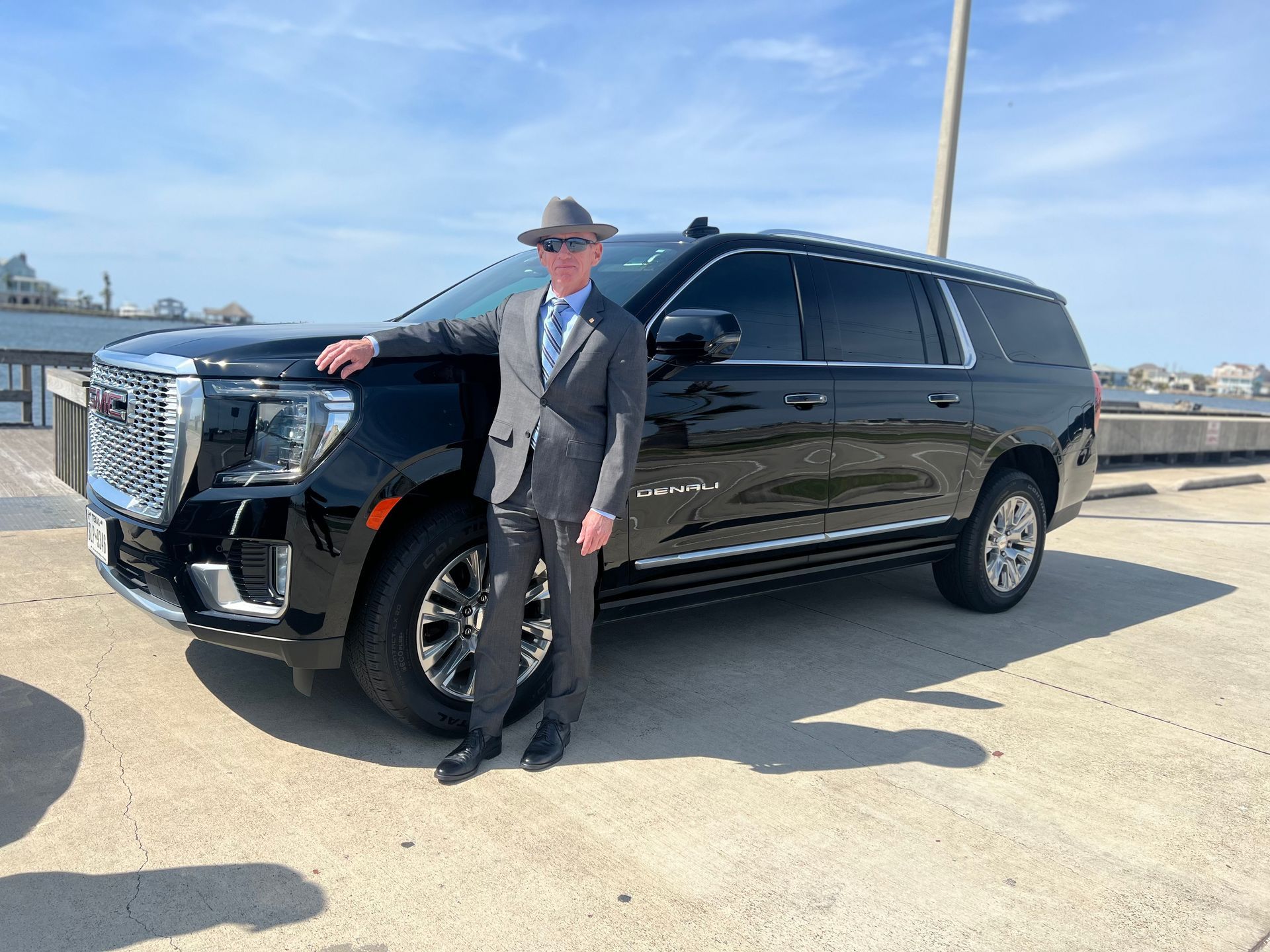 A black gmc yukon is shown on a white background.