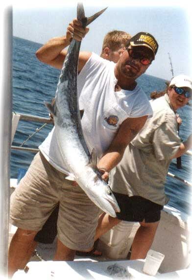 Man with Long Fish — Fort Myers, FL — Captain Tony’s Fishing Adventures