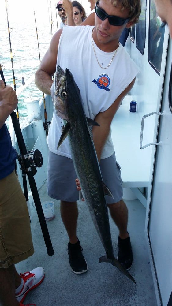 Holding Long Fish — Fort Myers, FL — Captain Tony’s Fishing Adventures
