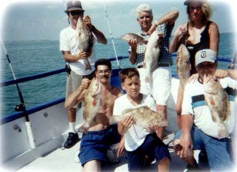 Group of People with Fish — Fort Myers, FL — Captain Tony’s Fishing Adventures