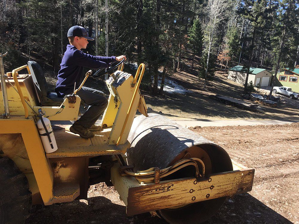 Boy On Road Rollers — La Luz, NM — R.D. Blankenship Dirt Work LLC