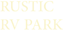 Pale gold “RUSTIC RV PARK” text on a white background